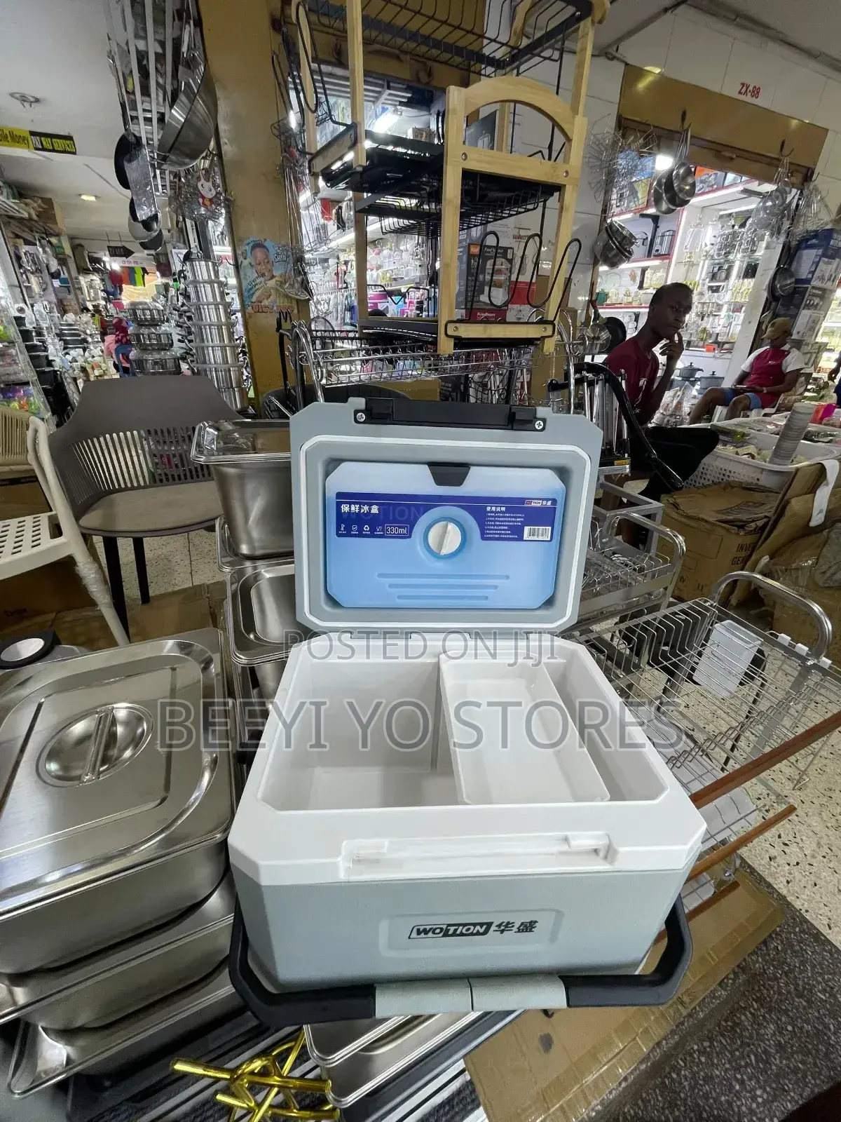 Portable Wotion-Branded Cooler Box.