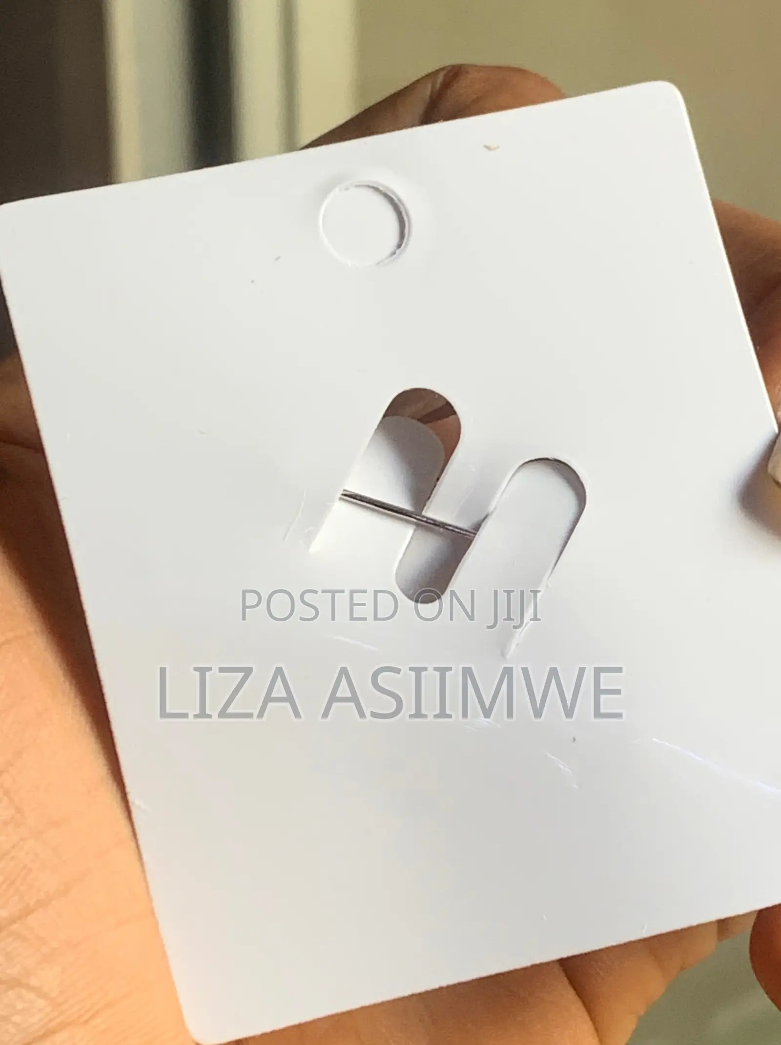 Brand Bow Brooch Features a Distinctive Black and White Rhinestone