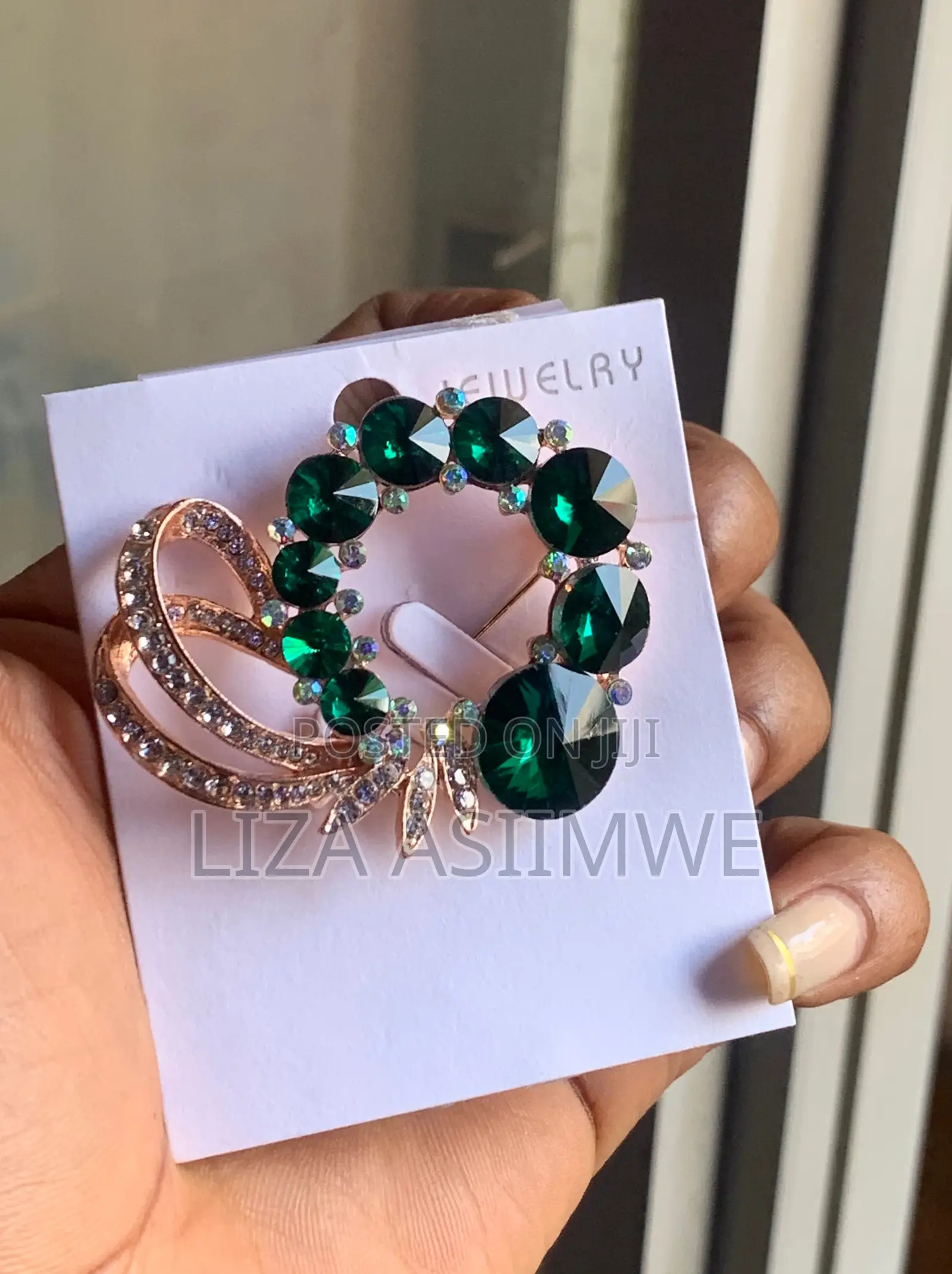 Rosegold Tone Brooch Features Emerald Green and Iridescent Rhinestones