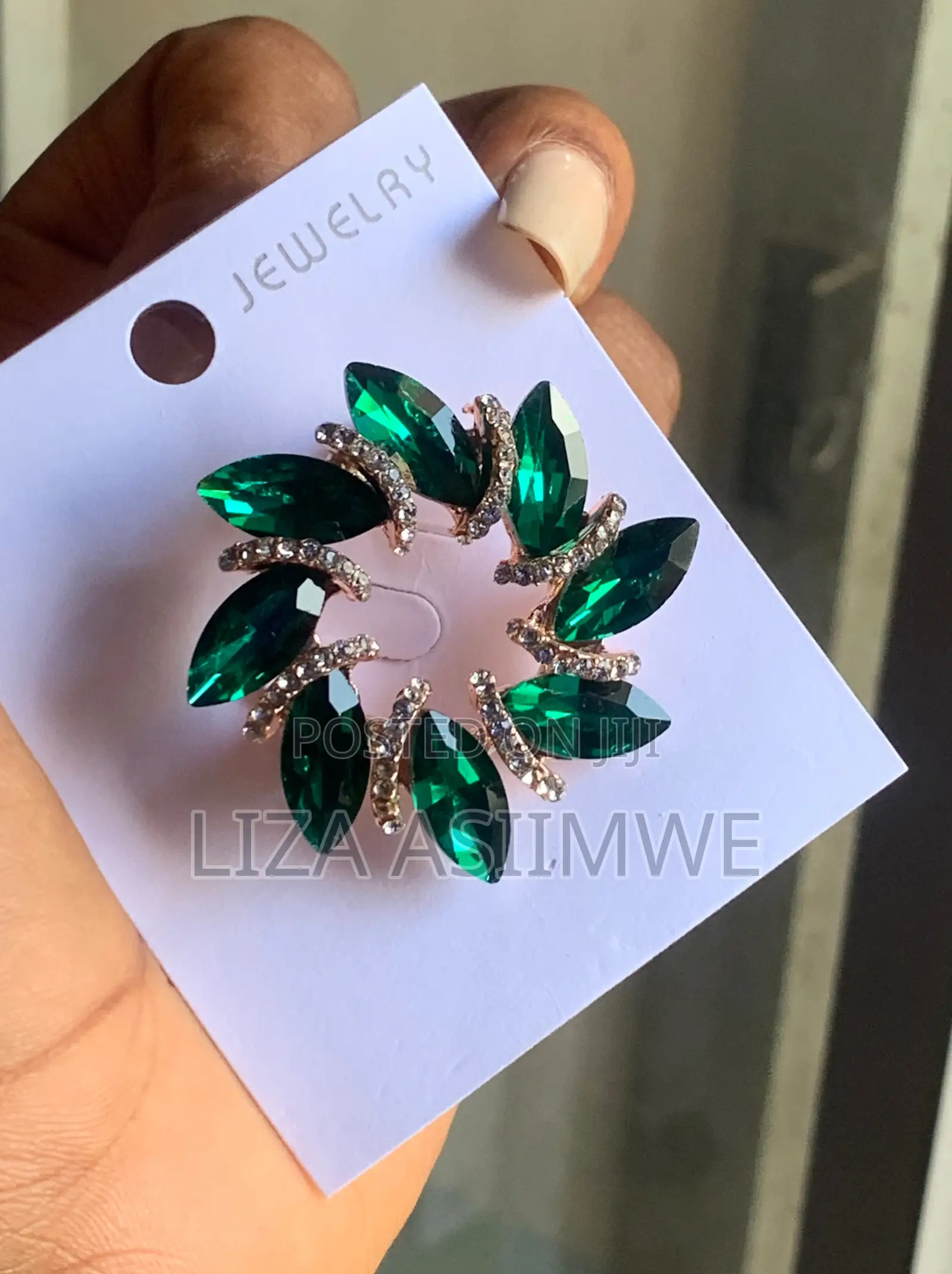Garland Brooch Features Marquise-Cut Green Crystals