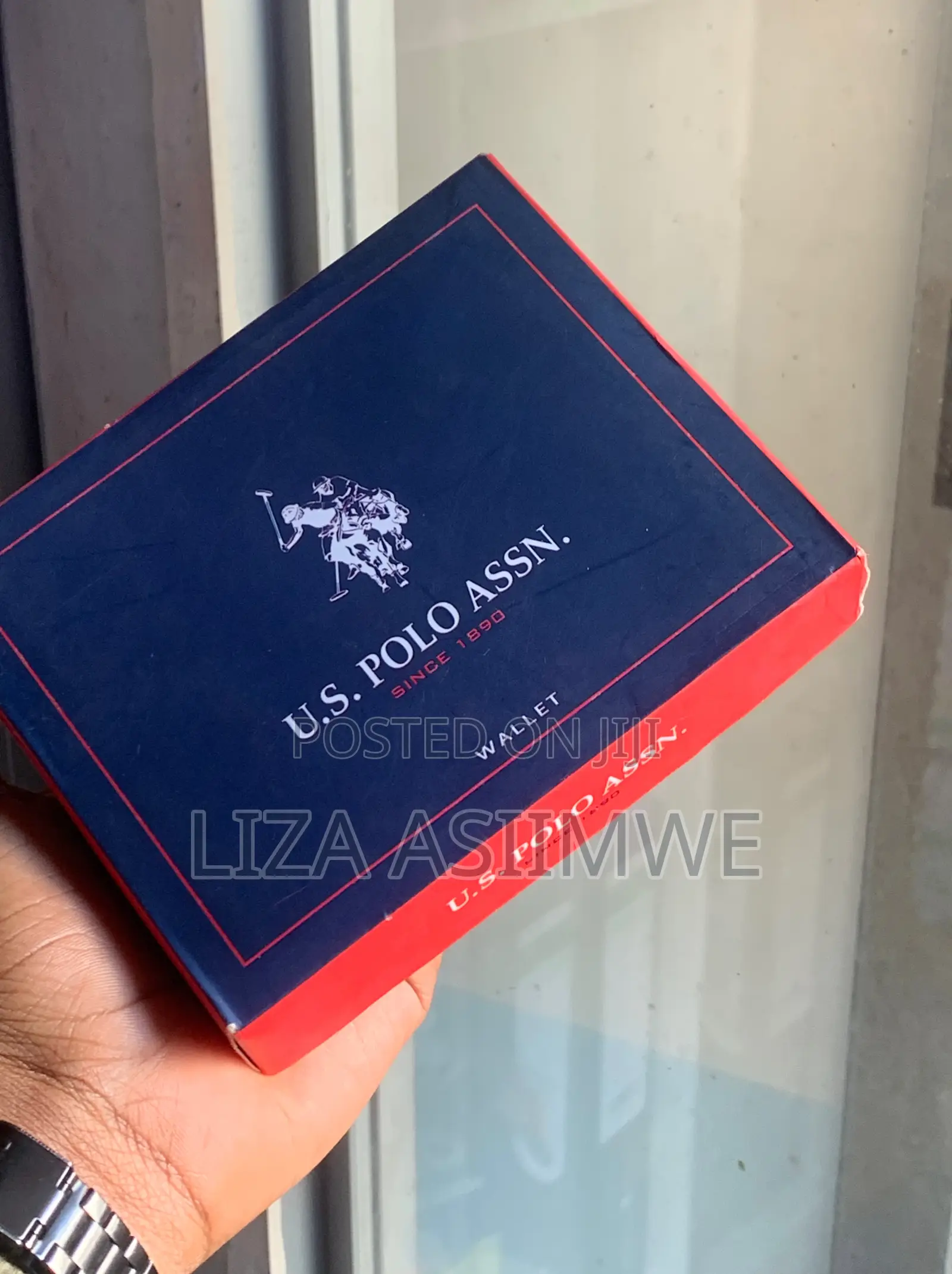 Brown Leather Bifold Wallet Features an Embossed U.S. Polo. (Uspa)