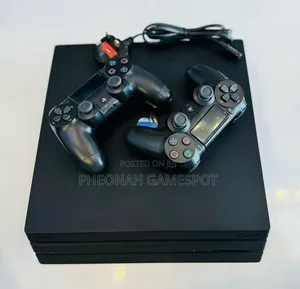 Chipped Sony Playstation 4 Pro. Ps4 Pro With 34 Games and 2 Controller