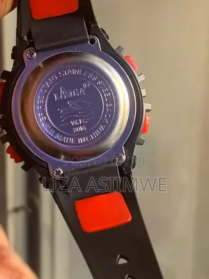 Kids Sports Watch With A Durable Black Strap And A Vibrant Red Bezel