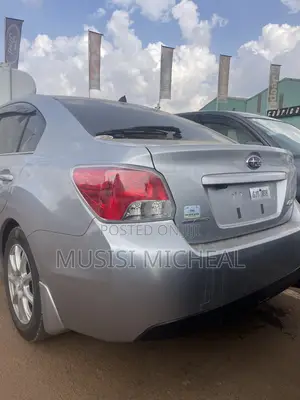 Subaru Impreza 2.0i Limited PZEV 4dr Hatchback AWD (2.0L 4cyl CVT) 2015