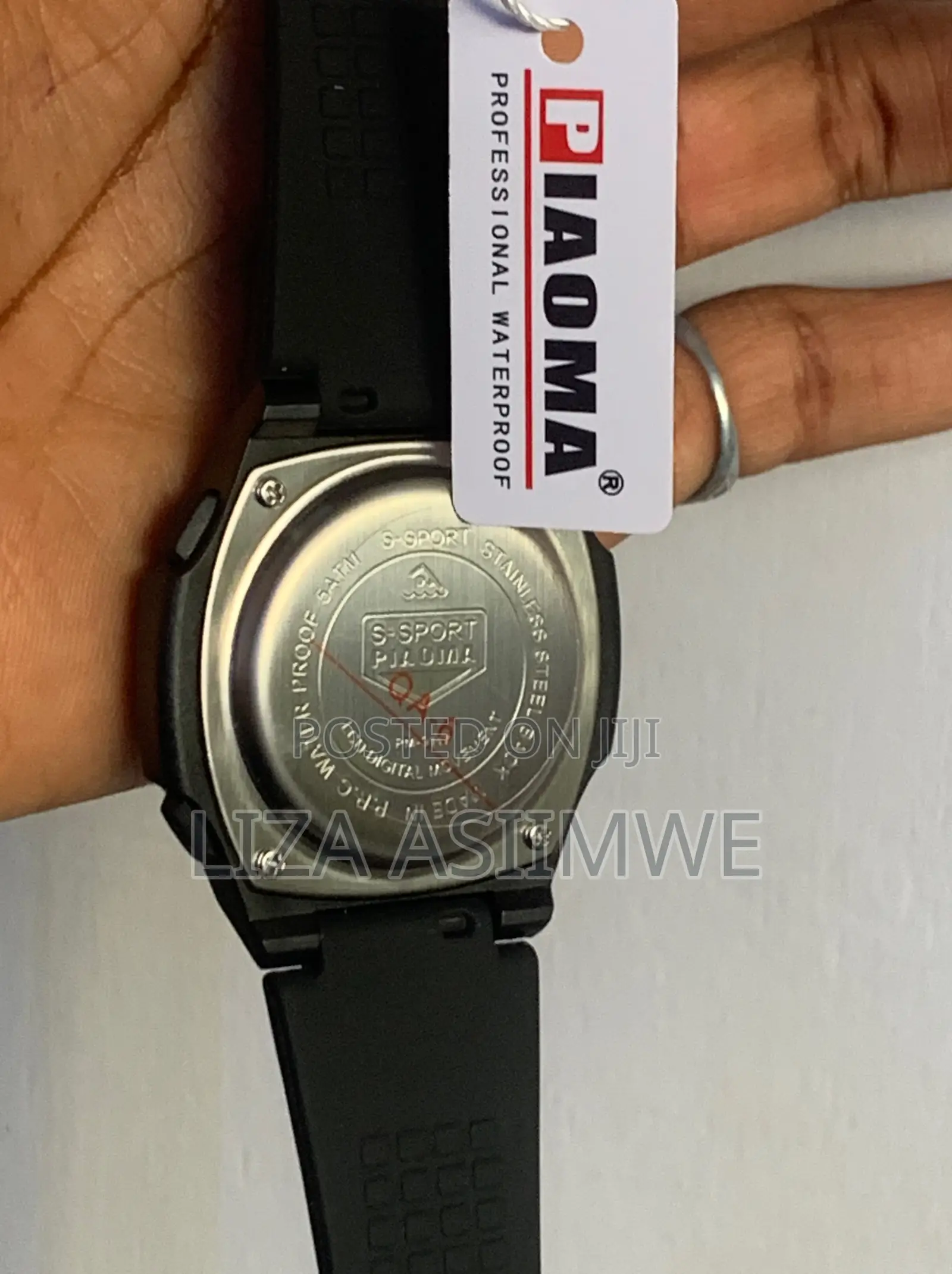 Men’S Digital Watch With a Black Silicone Strap and Is Water Resistant