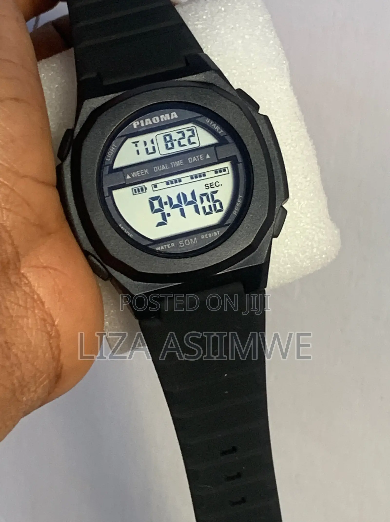 Men’S Digital Watch With a Black Silicone Strap and Is Water Resistant