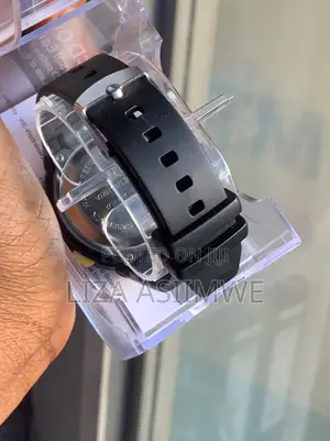 Kids Digital Watch Features A Black Strap And Yellow Accents