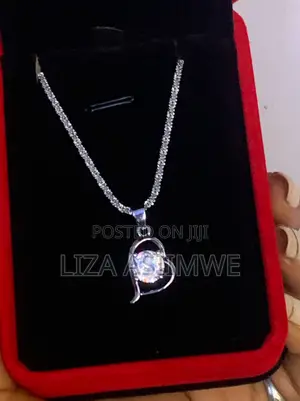 Lady’S Sparkling Zirconia Stone Set Within a Modern Open-Heart Pendant