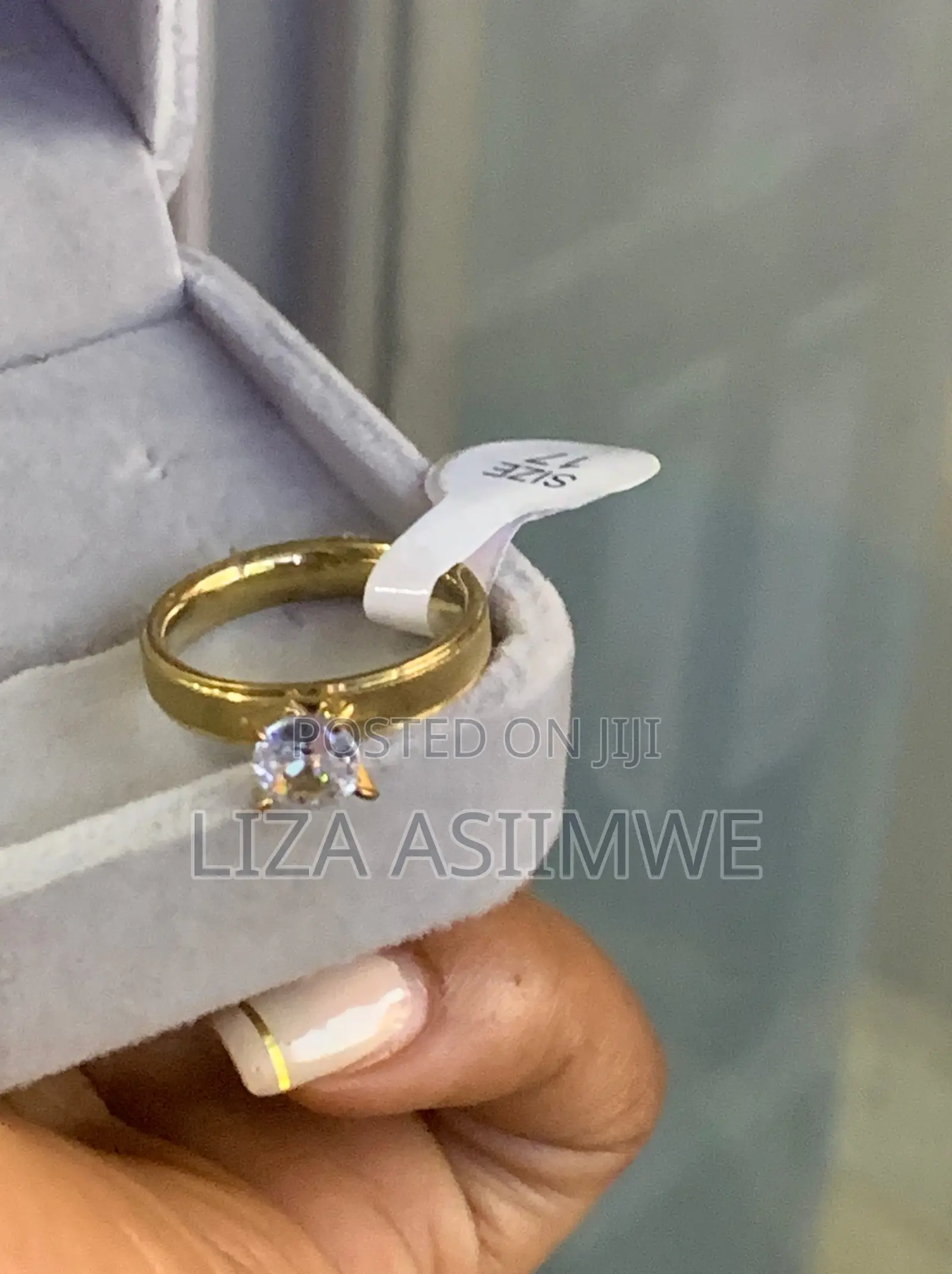 Engagement Ring Features a Clear Round Cut Cubic Zirconia Stone