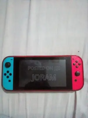 Nintendo Switch – Neon Red Blue Joycons + Free Cover
