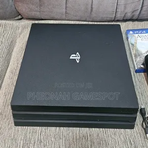 Super-Loaded Sony Ps4 Pro in Pristine Condition. It Has 35 Games, 1tb