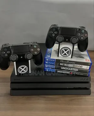 Fairly New Ps4 Pro. 1tb Console. Comes With 32 Games, 2 Controllers