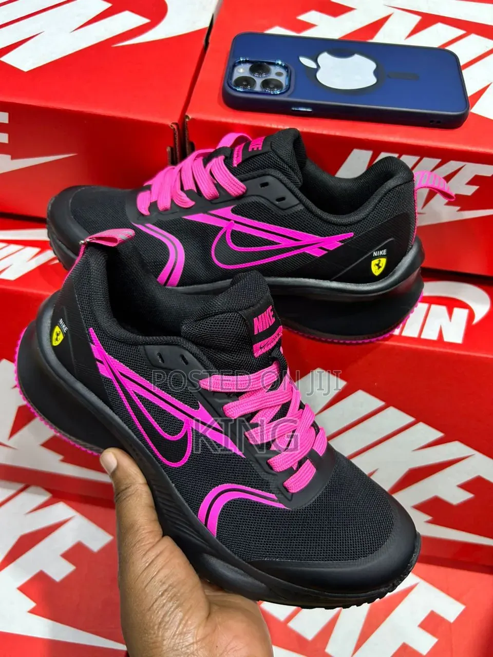 Nike Zoom Running Shoes in Black and Pink.