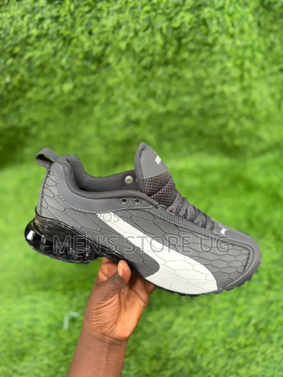 Puma Sneakers Featuring a Distinct Honeycomb Textured Grey and White