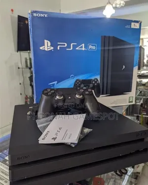 Get a Ps4 Pro With 2 Pads and 32 Games
