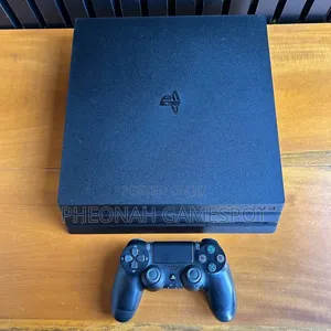Nice Playstation 4 Pro 'Ps4 Pro' With 32 Games and 2 Controllers