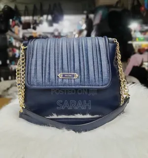 Tan and Gold Pleated Handbags