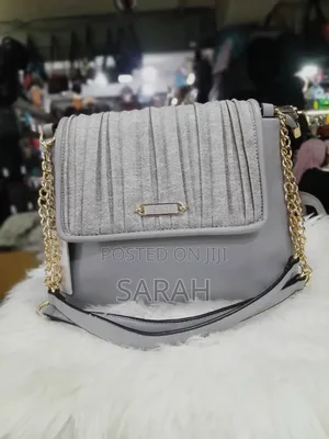 Tan and Gold Pleated Handbags
