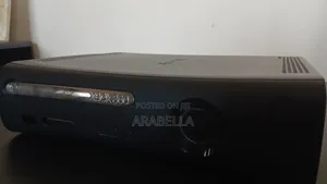 Xbox 360 Console With Two Controllers And Two Games