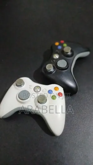 Xbox 360 Console With Two Controllers And Two Games