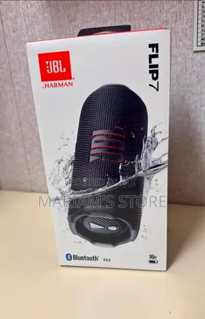 Jbl Flip 7 Portable Bluetooth Speaker With A Black Racetrack-shape.]