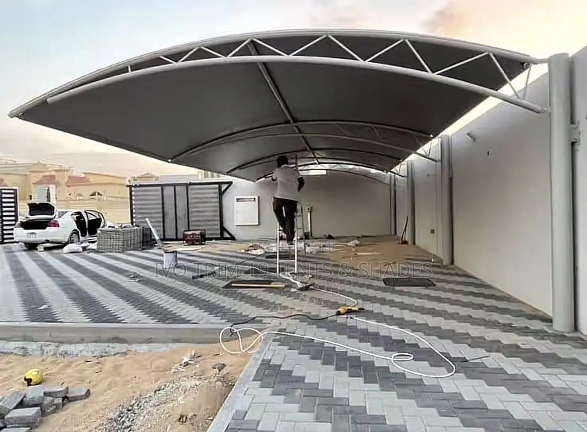 Cantilevered Truss-Arch Car Parking Shade.