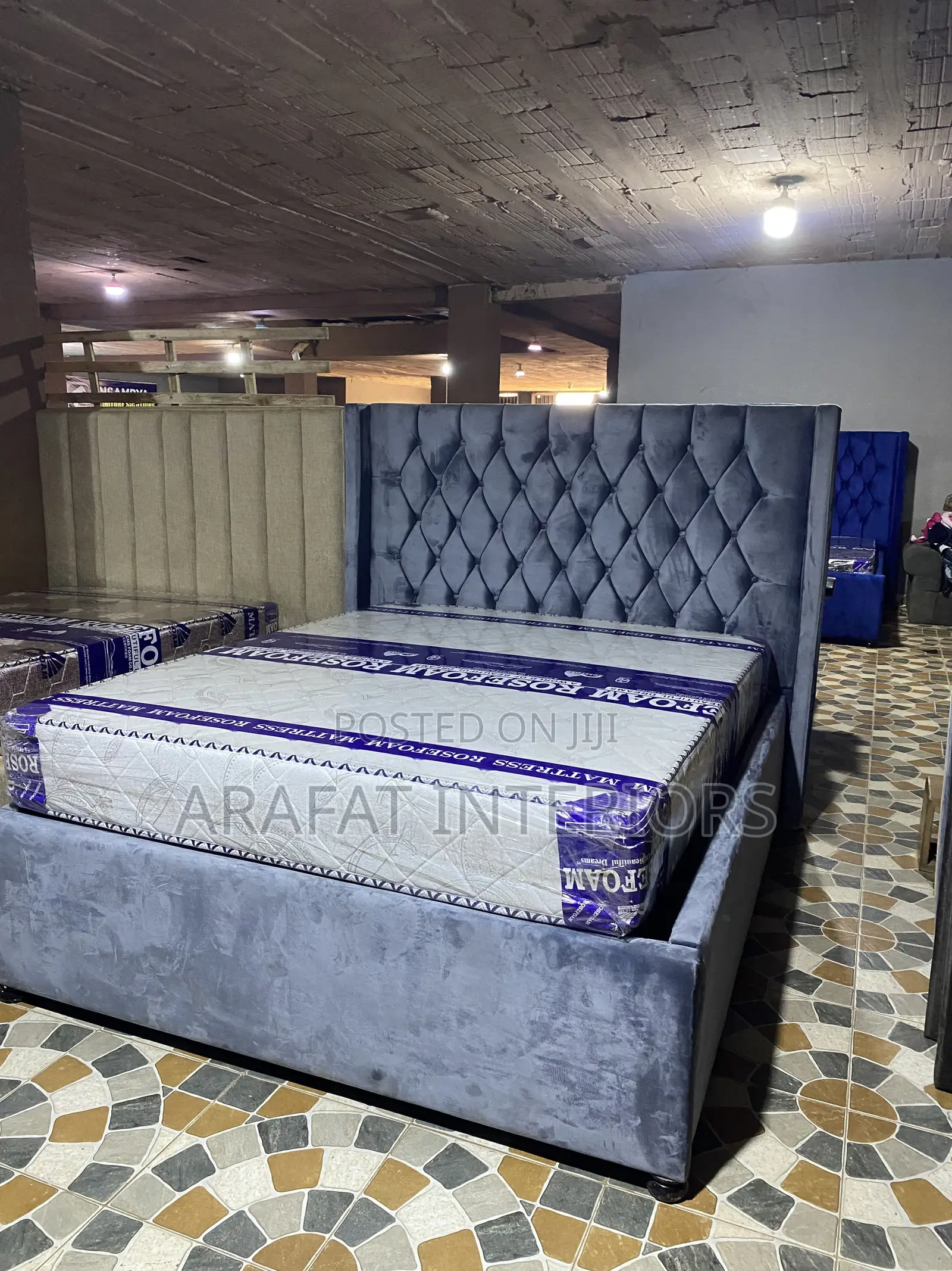 Elegant Wingback Tufted Bed