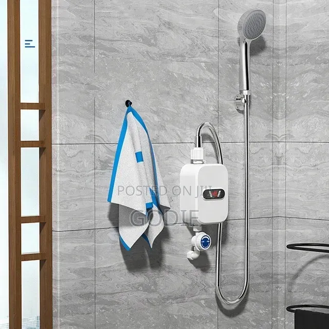 Temmax Rx-021 Thermostatic Water Heater, an Electric, Tankless Unit
