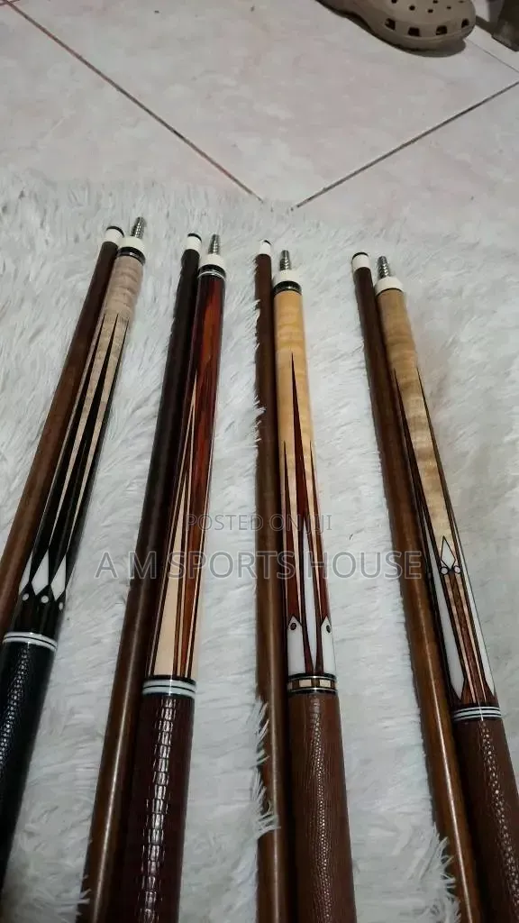 Cue Sticks Pic for Pool Table