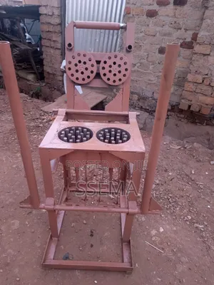 Two Honey Comb Briquettes Machine Making
