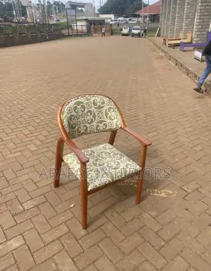 This Is a Classic Wooden Armchair With Upholstered Seat and Back.