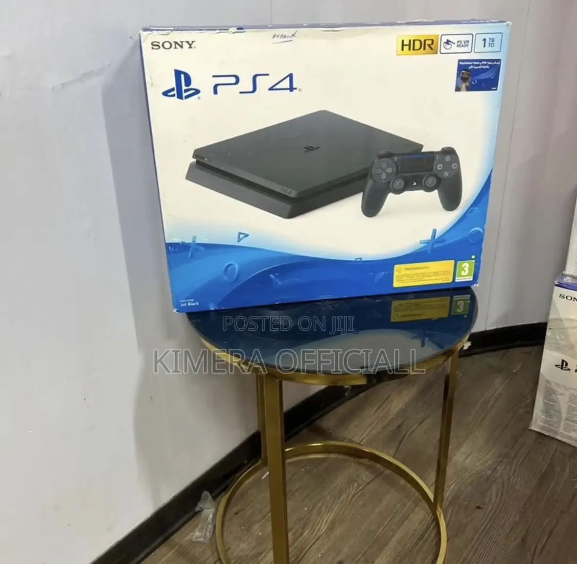 Used Playstation 4 Slim in a Box. Almost New. With 2 Pads and 12 Games