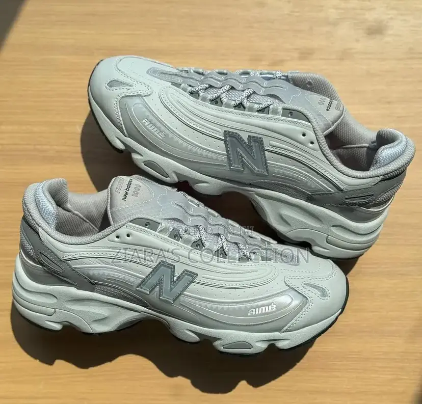 Aime Dore New Balance 100 Trainer Sneakers