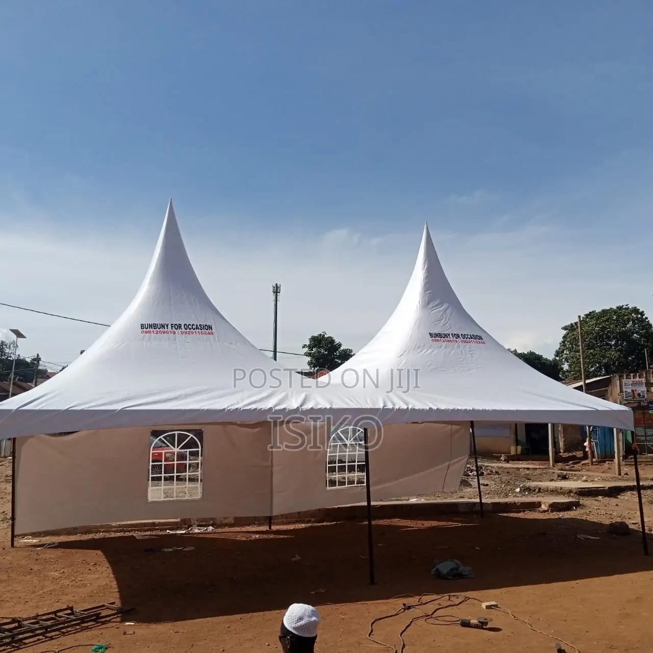 A Creamy White 100 Seater With 3 Sides