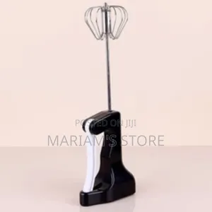Semi-Automatic Kitchen Whisk With a Black Handle.