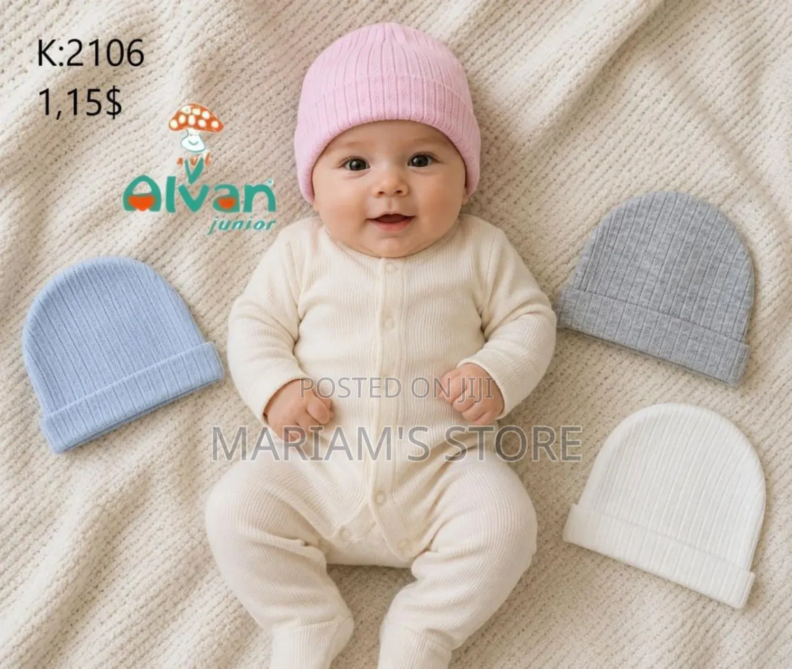 A Soft, Cream-Colored Ribbed Baby Romper With Matching Cap