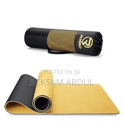 Rigid Fitness Tpe Yoga Mat in a Gold and Black Color Scheme.