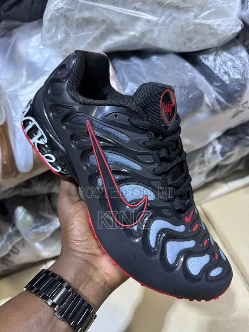 Nike Air Max Plus Drift in a Black and University Red "Bred"