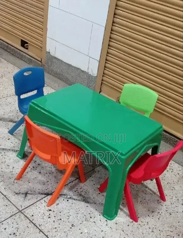 A Set of Plastic Kids Table and 4 Chairs