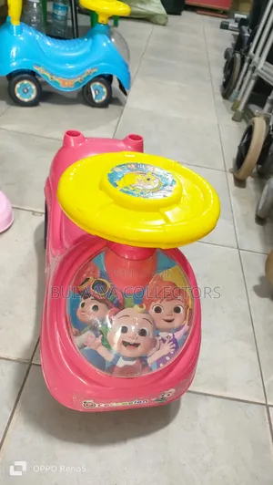 Uk Used Red and Yellow Cocomelon My First Sit and Ride Toy Car.