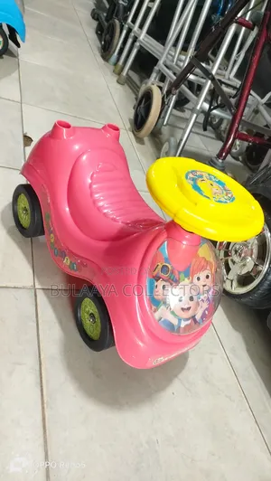 Uk Used Red and Yellow Cocomelon My First Sit and Ride Toy Car.