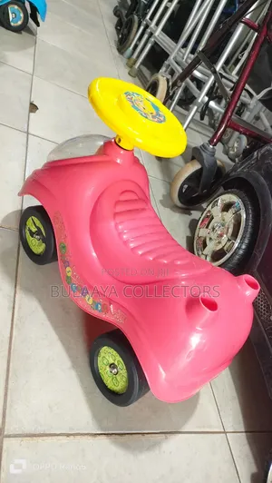 Uk Used Red and Yellow Cocomelon My First Sit and Ride Toy Car.