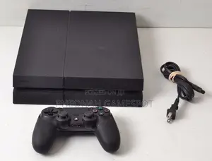 Chipped Ps4 Gaming System With 2 Pads and Many Games