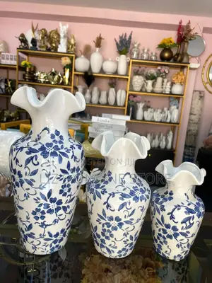 Ceramic Chinoiserie Vases Featuring a Blue and White Floral Pattern.