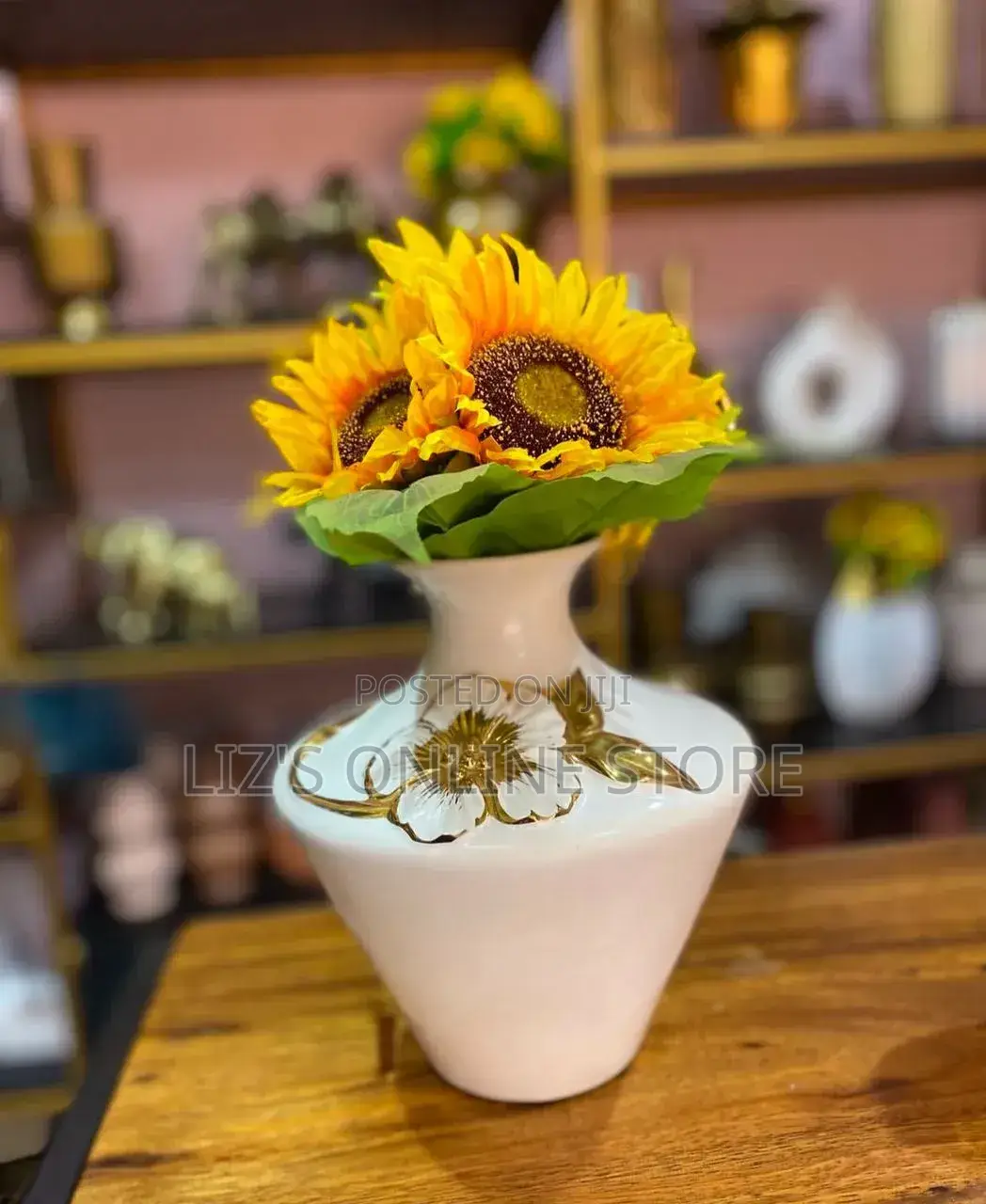 White Ceramic Vase Features Dimensional Gold Floral Details