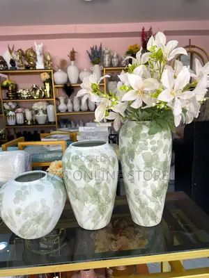 Rustic Farmhouse Vase Features a Unique Green Splatter Design