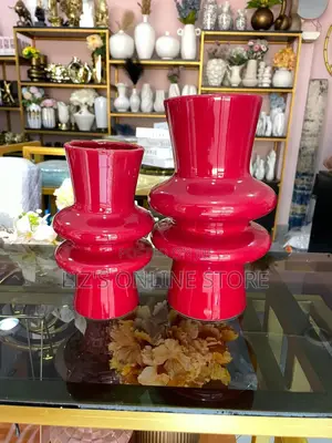 Red Ceramic Vases Feature a Modern, Sculptural Design