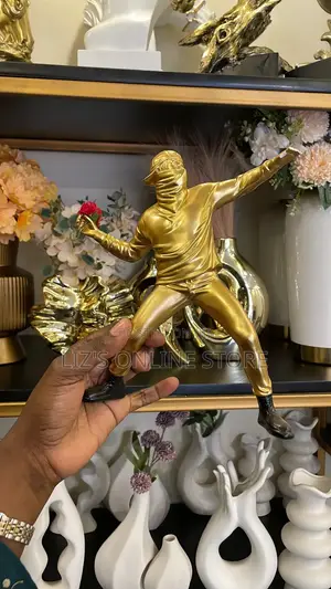 Banksy Flower Thrower Statue, a Resin Sculpture