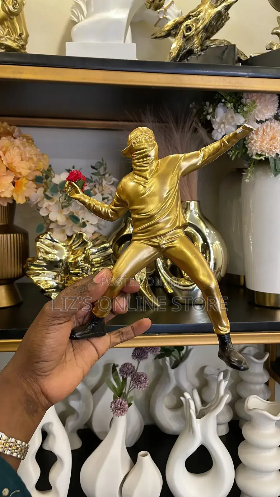 Banksy Flower Thrower Statue, a Resin Sculpture