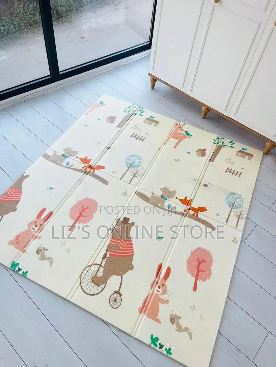 Foldable Baby Play Mat Featuring an Animal-Themed Print With Bunnies